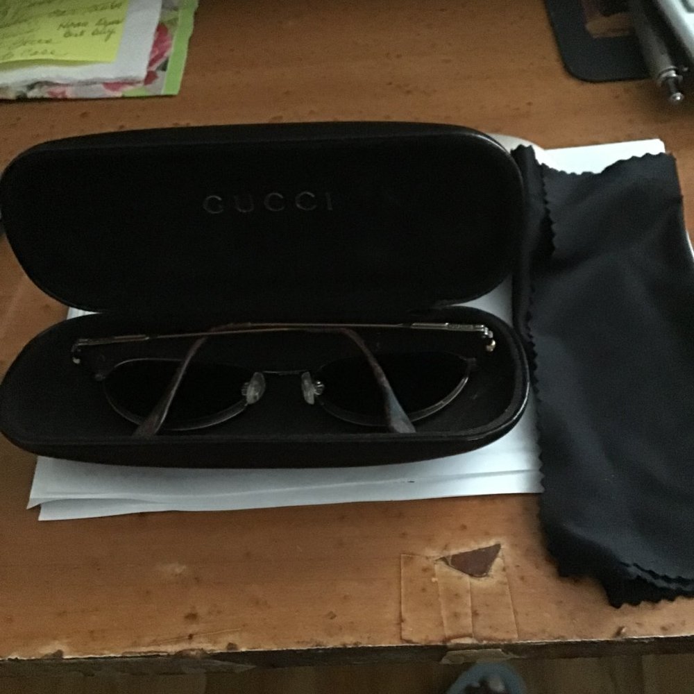 Pair of Woman's Gucci sunglasses